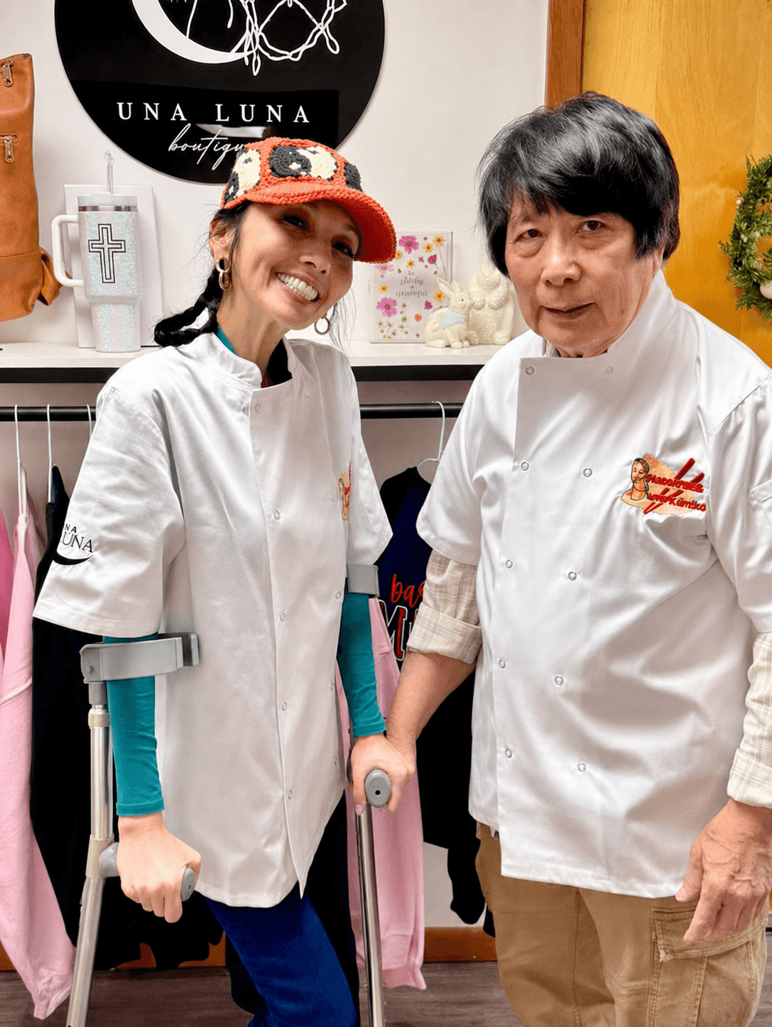 The owner of Daughters Dumplings and her father, both in chef whites
